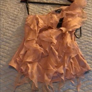 Bebe cold shoulder silk blouse.Size XS. Never worn